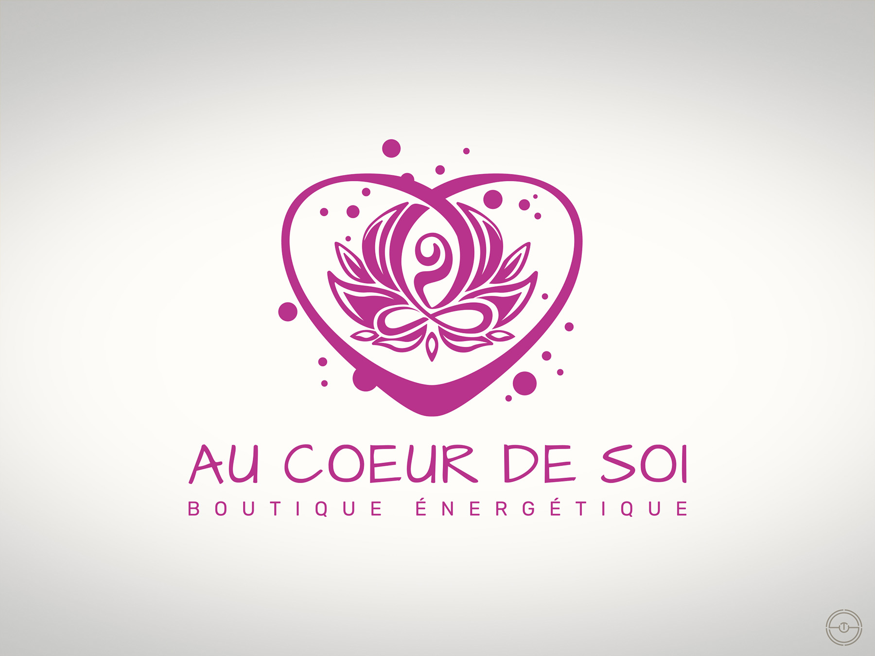 Réalisation d'un logo aux couleurs rose pour la société Au Coeur de Soi, boutique ésotérique à Rodez dans l'Aveyron